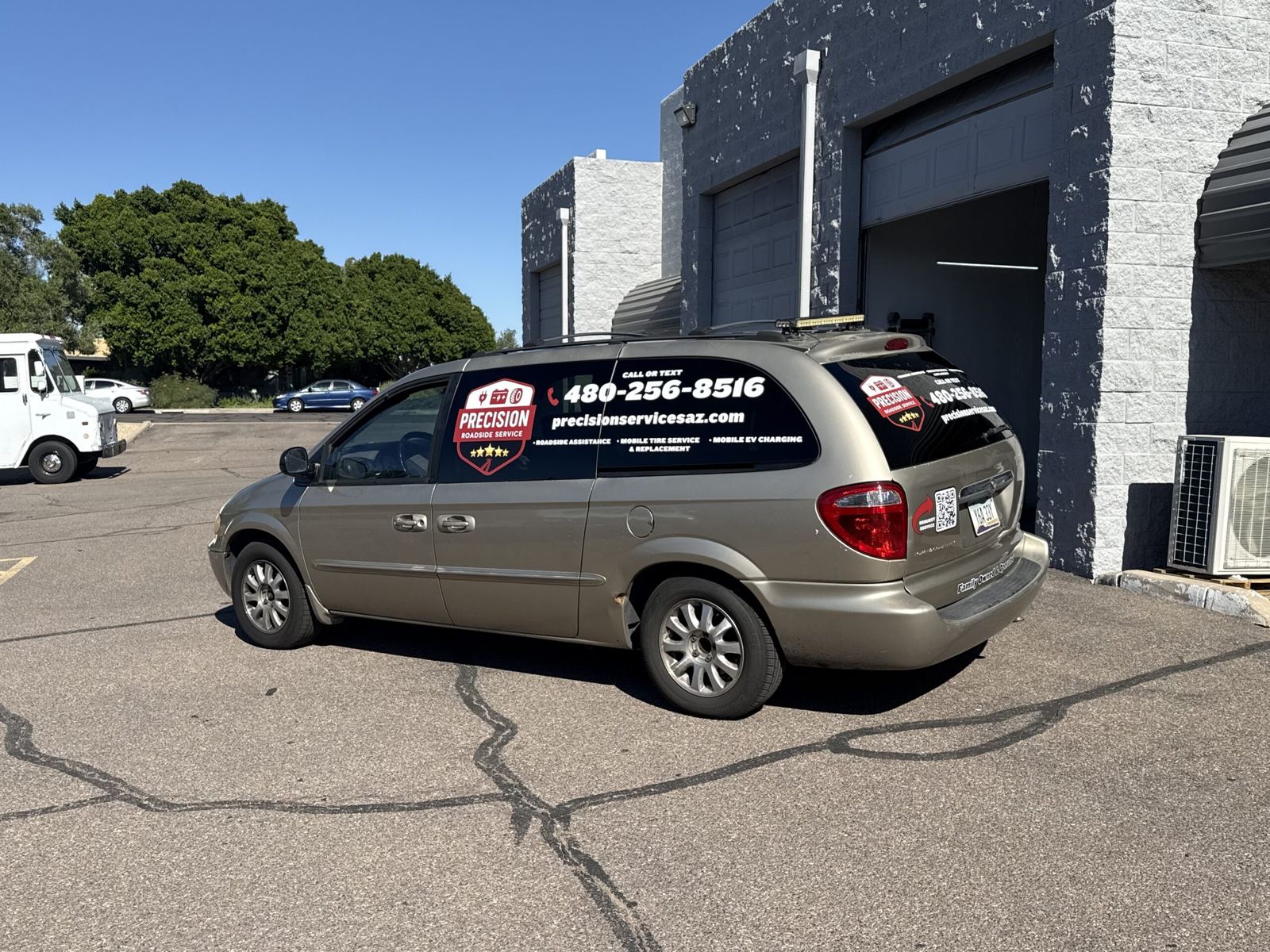 Precision Roadside Service marked service van
