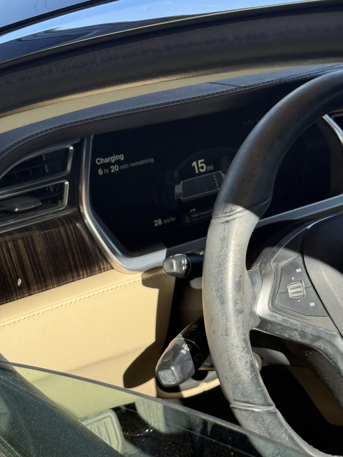 EV dashboard showing the vehicle is charging