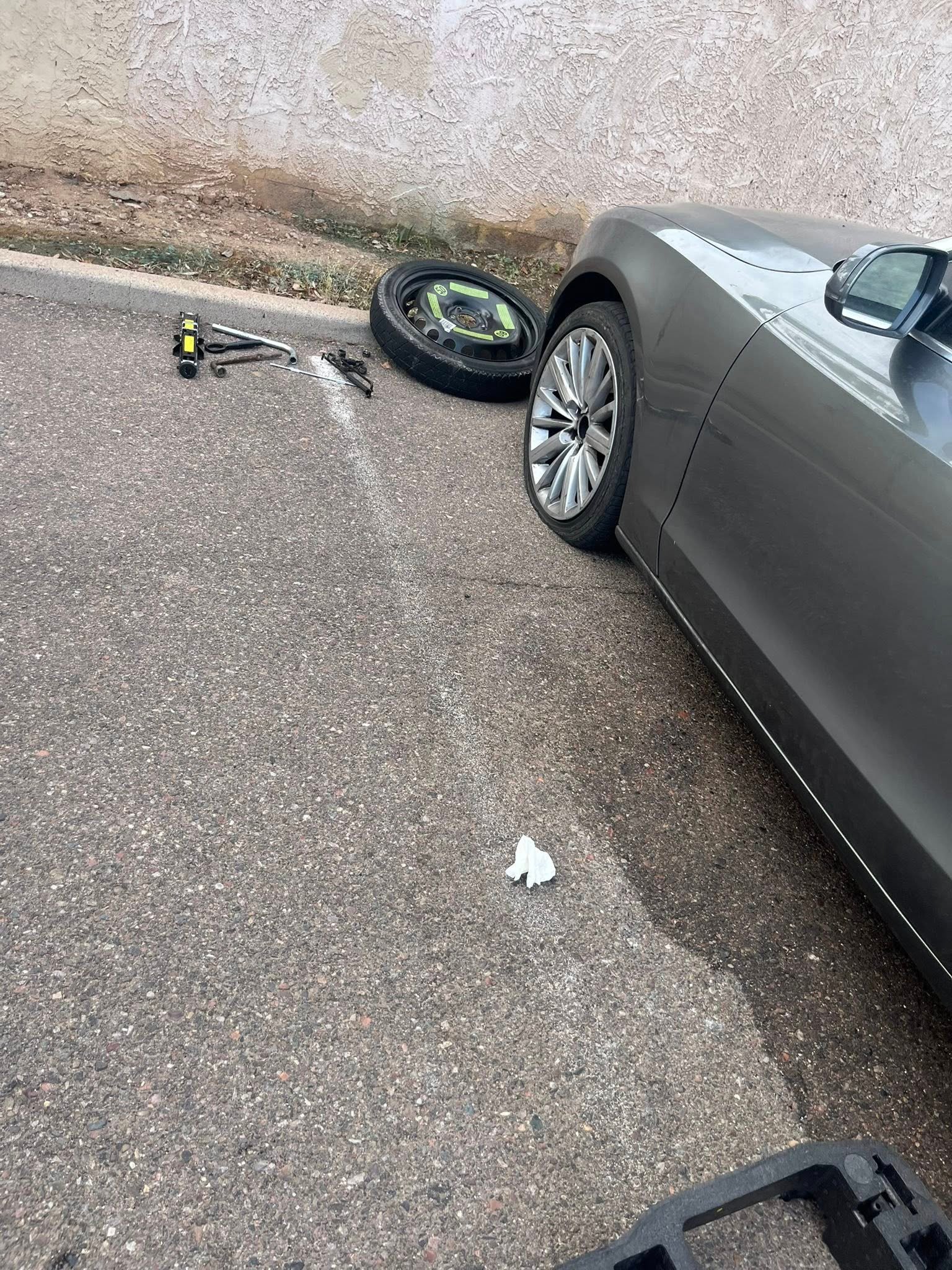 Roadside assistance flat tire repair and spare tire change