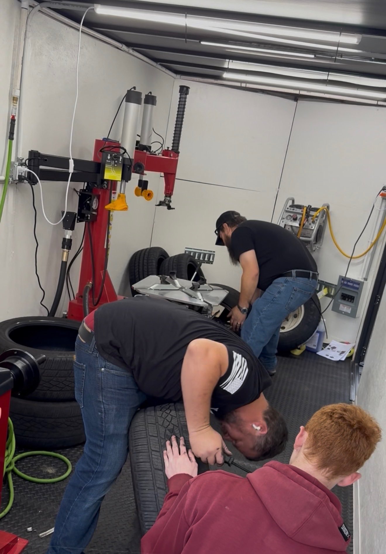 Mobile tire service working on a truck in the field