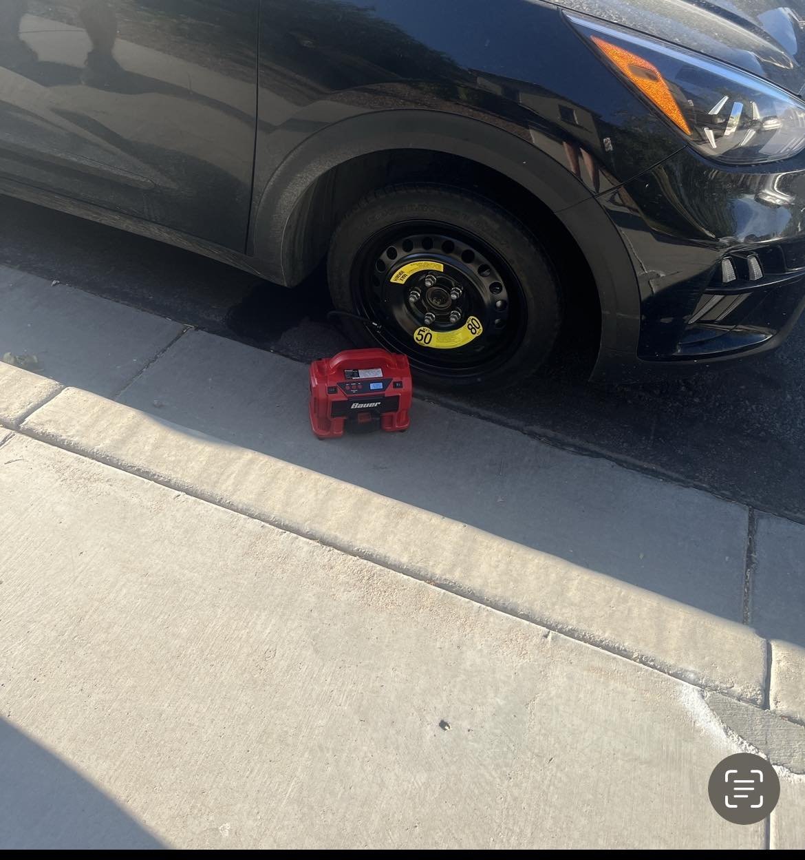 Roadside assistance flat tire repair and spare tire change in Mesa